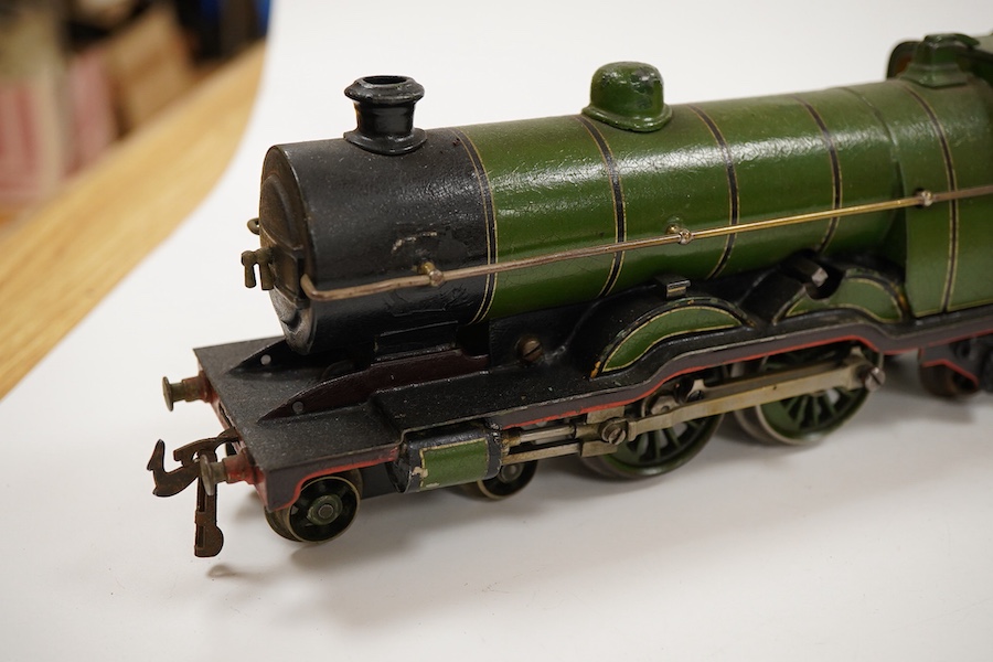 An 0 gauge Bing (or possibly Carette) for Bassett-Lowke tinplate clockwork GNR 4-4-2 tender locomotive, 1442, with original clockwork mechanism in yellow and black lined green livery